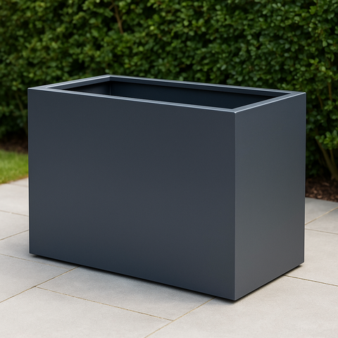 Trough planter in grey on a patio in garden